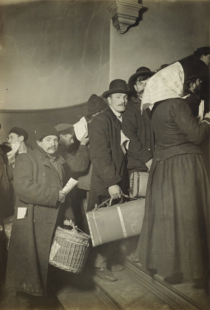 LEWIS W. HINE (1874-1940) Climbing into America (Ellis Island group).